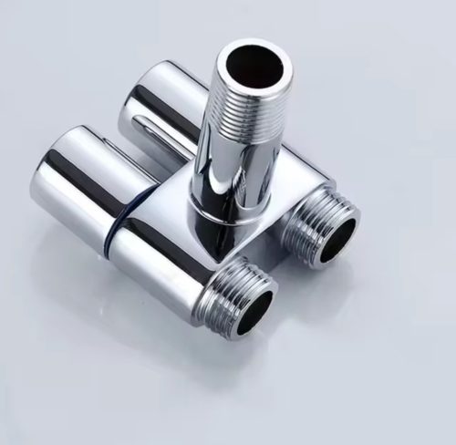 1000233691.jpg Válvula doble, conexión de 1/2" Acero Cromado, pesada.